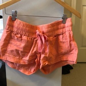 Rip Curl orange shorts